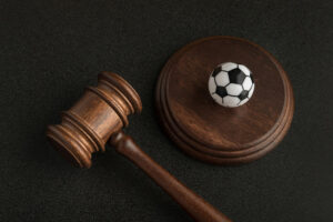 Football and Auction Hammer