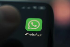 WhatsApp logo on mobile